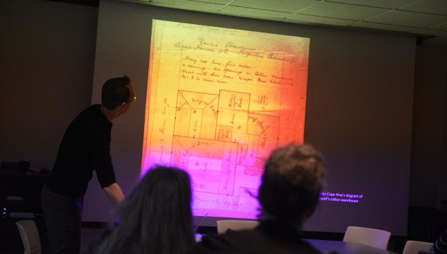 A person giving a lecture on informational images.
